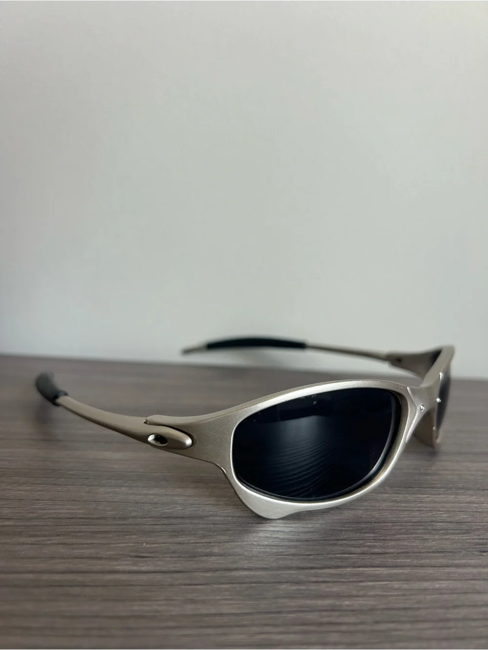 Oakley Men's Silver Frame Sunglasses with Black Lenses